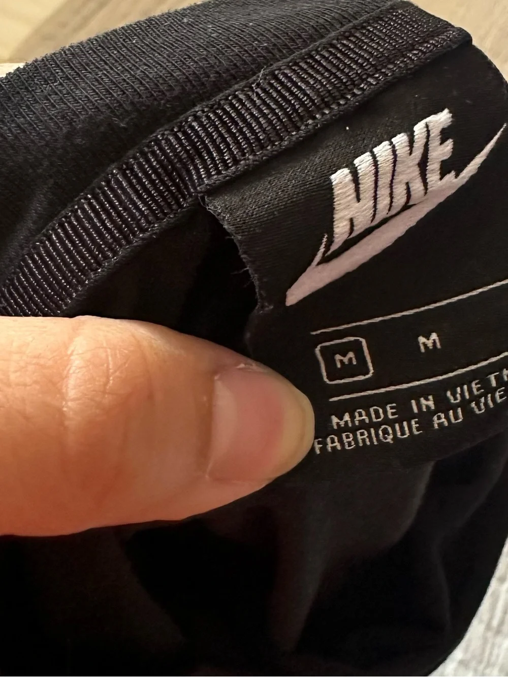 Nike Black T-Shirt with White Swoosh Logo